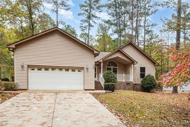Welcome to this beautiful 3-bedroom, 2-bath home located in a on Carolina Trace Country Club in North Carolina - for sale on GolfHomes.com, golf home, golf lot