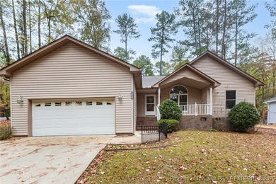 Welcome to this beautiful 3-bedroom, 2-bath home located in a on Carolina Trace Country Club in North Carolina - for sale on GolfHomes.com, golf home, golf lot