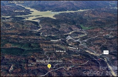 Tucked inside the gated community of Riverbend at Lake Lure on Lake Lure Municipal Golf Course in North Carolina - for sale on GolfHomes.com, golf home, golf lot