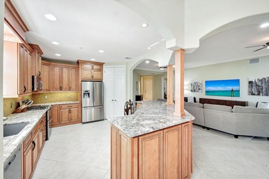 Beautifully appointed first-floor coach home in the double-gated on The Rookery At Marco in Florida - for sale on GolfHomes.com, golf home, golf lot