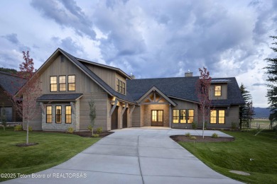 This custom home in Teton Reserve offers a unique plan with on Teton Reserve in Idaho - for sale on GolfHomes.com, golf home, golf lot