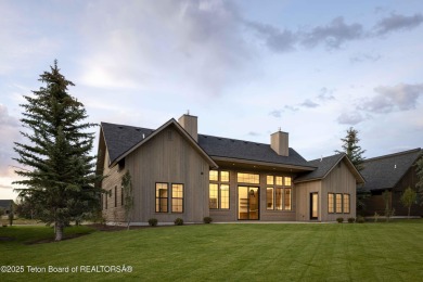 This custom home in Teton Reserve offers a unique plan with on Teton Reserve in Idaho - for sale on GolfHomes.com, golf home, golf lot