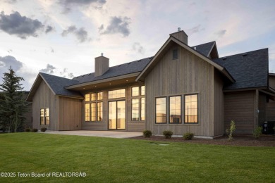 This custom home in Teton Reserve offers a unique plan with on Teton Reserve in Idaho - for sale on GolfHomes.com, golf home, golf lot