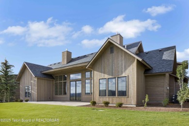 This custom home in Teton Reserve offers a unique plan with on Teton Reserve in Idaho - for sale on GolfHomes.com, golf home, golf lot