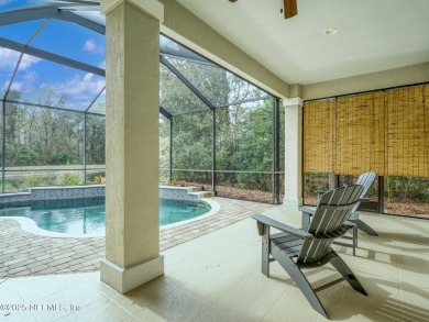 Welcome to this stunning single-level 4-bedroom, 3-bath POOL on Golf Club At North Hampton in Florida - for sale on GolfHomes.com, golf home, golf lot