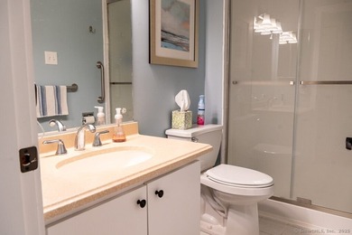 EXCEPTIONAL FIRST FLOOR END UNIT WITH GOLF COURSE FRONTAGE AND on  in Connecticut - for sale on GolfHomes.com, golf home, golf lot