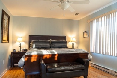 EXCEPTIONAL FIRST FLOOR END UNIT WITH GOLF COURSE FRONTAGE AND on  in Connecticut - for sale on GolfHomes.com, golf home, golf lot