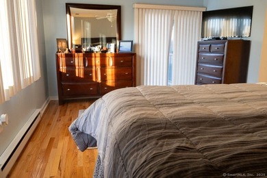 EXCEPTIONAL FIRST FLOOR END UNIT WITH GOLF COURSE FRONTAGE AND on  in Connecticut - for sale on GolfHomes.com, golf home, golf lot