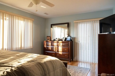 EXCEPTIONAL FIRST FLOOR END UNIT WITH GOLF COURSE FRONTAGE AND on  in Connecticut - for sale on GolfHomes.com, golf home, golf lot