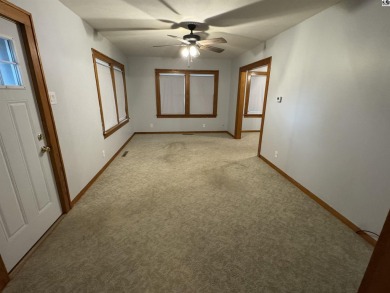 Beautiful home across the street for the Lyons Golf Course on Lyons Town and Country Club in Kansas - for sale on GolfHomes.com, golf home, golf lot