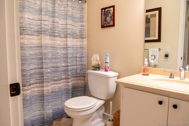 EXCEPTIONAL FIRST FLOOR END UNIT WITH GOLF COURSE FRONTAGE AND on  in Connecticut - for sale on GolfHomes.com, golf home, golf lot