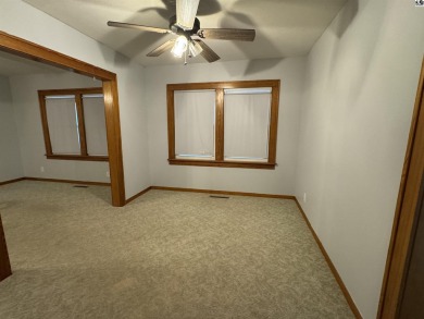 Beautiful home across the street for the Lyons Golf Course on Lyons Town and Country Club in Kansas - for sale on GolfHomes.com, golf home, golf lot