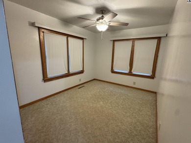 Beautiful home across the street for the Lyons Golf Course on Lyons Town and Country Club in Kansas - for sale on GolfHomes.com, golf home, golf lot