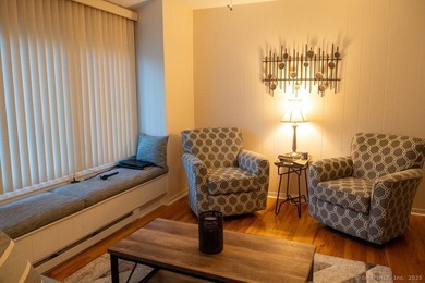 EXCEPTIONAL FIRST FLOOR END UNIT WITH GOLF COURSE FRONTAGE AND on  in Connecticut - for sale on GolfHomes.com, golf home, golf lot