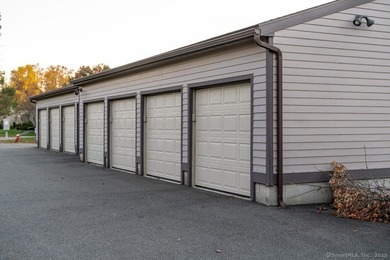 EXCEPTIONAL FIRST FLOOR END UNIT WITH GOLF COURSE FRONTAGE AND on  in Connecticut - for sale on GolfHomes.com, golf home, golf lot