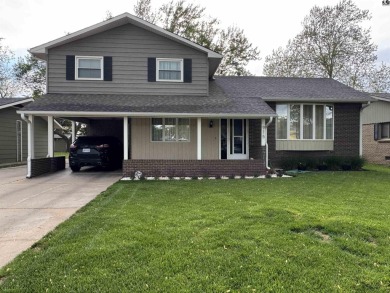 Beautiful Park, Pool and Golf Course view.  Two owner home on Lyons Town and Country Club in Kansas - for sale on GolfHomes.com, golf home, golf lot