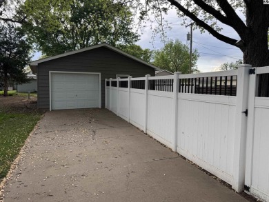 Beautiful Park, Pool and Golf Course view.  Two owner home on Lyons Town and Country Club in Kansas - for sale on GolfHomes.com, golf home, golf lot