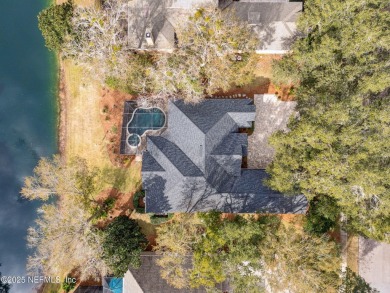 Welcome to this stunning single-level 4-bedroom, 3-bath POOL on Golf Club At North Hampton in Florida - for sale on GolfHomes.com, golf home, golf lot