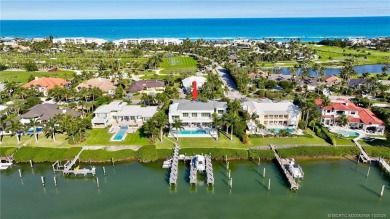 Experience the best of luxury living in this waterfront coastal on Sailfish Point Golf Club, Inc. in Florida - for sale on GolfHomes.com, golf home, golf lot