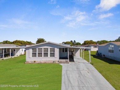 Welcome to this charming 2-BEDROOM, 2-BATHROOM, offering 1,178 on Brookridge Country Club in Florida - for sale on GolfHomes.com, golf home, golf lot