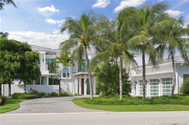 Experience the best of luxury living in this waterfront coastal on Sailfish Point Golf Club, Inc. in Florida - for sale on GolfHomes.com, golf home, golf lot