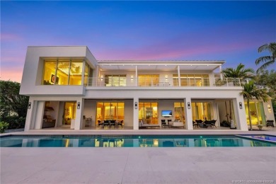 Experience the best of luxury living in this waterfront coastal on Sailfish Point Golf Club, Inc. in Florida - for sale on GolfHomes.com, golf home, golf lot