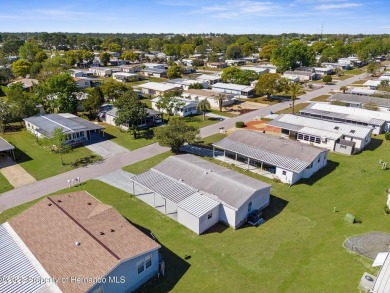 Welcome to this charming 2-BEDROOM, 2-BATHROOM, offering 1,178 on Brookridge Country Club in Florida - for sale on GolfHomes.com, golf home, golf lot