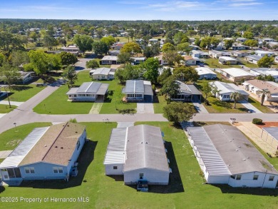 Welcome to this charming 2-BEDROOM, 2-BATHROOM, offering 1,178 on Brookridge Country Club in Florida - for sale on GolfHomes.com, golf home, golf lot