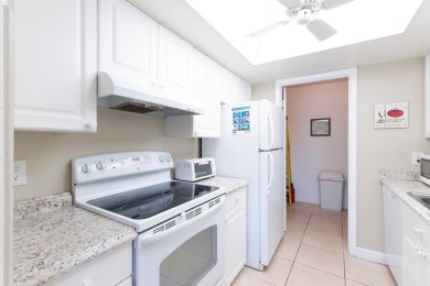 Bright and spacious 3 bedroom 2 bath condo with new roof and AC on Ocean Village Golf Course in Florida - for sale on GolfHomes.com, golf home, golf lot