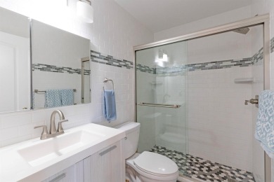 Bright and spacious 3 bedroom 2 bath condo with new roof and AC on Ocean Village Golf Course in Florida - for sale on GolfHomes.com, golf home, golf lot
