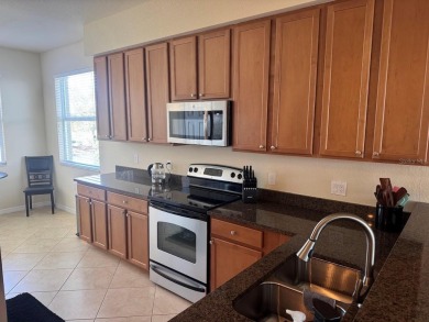 **This END UNIT + FLEX ROOM rarely becomes available, offering on River Strand Golf and Country Club At Heritage Harbour  in Florida - for sale on GolfHomes.com, golf home, golf lot
