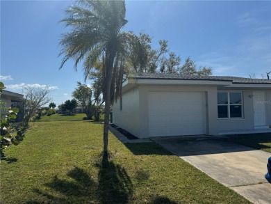 PRICE REDUCED***New roof 2023, New Tile throughout the home Feb on Port Charlotte Golf Club in Florida - for sale on GolfHomes.com, golf home, golf lot