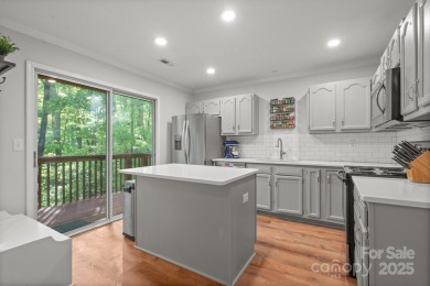 Welcome to this spacious townhouse at 9214 Arbourgate Meadows on Raintree Country Club in North Carolina - for sale on GolfHomes.com, golf home, golf lot