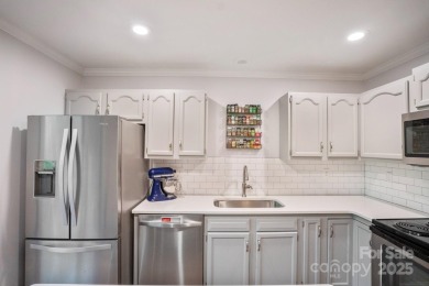 Welcome to this spacious townhouse at 9214 Arbourgate Meadows on Raintree Country Club in North Carolina - for sale on GolfHomes.com, golf home, golf lot