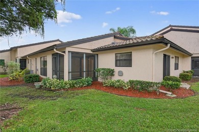 Welcome home to this beautifully updated single-story residence on Martin Downs Country Club in Florida - for sale on GolfHomes.com, golf home, golf lot
