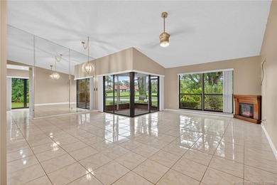 Welcome home to this beautifully updated single-story residence on Martin Downs Country Club in Florida - for sale on GolfHomes.com, golf home, golf lot