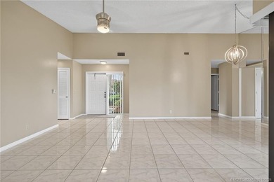Welcome home to this beautifully updated single-story residence on Martin Downs Country Club in Florida - for sale on GolfHomes.com, golf home, golf lot