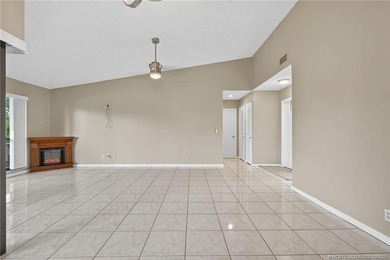 Welcome home to this beautifully updated single-story residence on Martin Downs Country Club in Florida - for sale on GolfHomes.com, golf home, golf lot