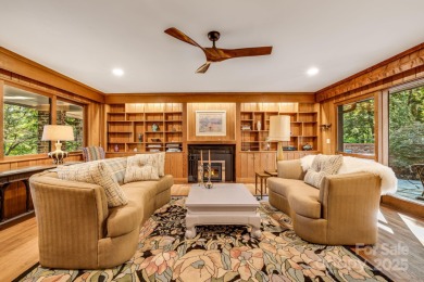 Access this beautifully remodeled Wright-inspired midcentury on Tryon Country Club in North Carolina - for sale on GolfHomes.com, golf home, golf lot