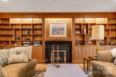 Access this beautifully remodeled Wright-inspired midcentury on Tryon Country Club in North Carolina - for sale on GolfHomes.com, golf home, golf lot