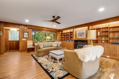 Access this beautifully remodeled Wright-inspired midcentury on Tryon Country Club in North Carolina - for sale on GolfHomes.com, golf home, golf lot