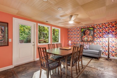 Access this beautifully remodeled Wright-inspired midcentury on Tryon Country Club in North Carolina - for sale on GolfHomes.com, golf home, golf lot
