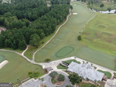 Beautiful lot situated on the 1st fairway of a Fred Couples' on The Golf Club At Sanctuary Cove in Georgia - for sale on GolfHomes.com, golf home, golf lot