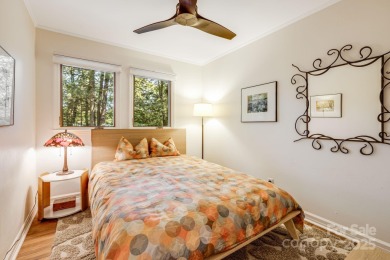 Access this beautifully remodeled Wright-inspired midcentury on Tryon Country Club in North Carolina - for sale on GolfHomes.com, golf home, golf lot