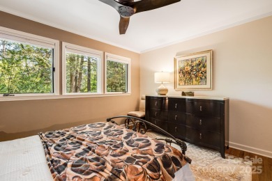 Access this beautifully remodeled Wright-inspired midcentury on Tryon Country Club in North Carolina - for sale on GolfHomes.com, golf home, golf lot