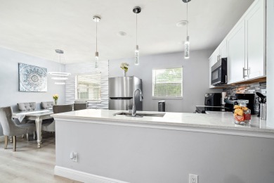 Beautifully renovated 2nd floor Condo is a must see.  White on Kings Point Golf - Executive in Florida - for sale on GolfHomes.com, golf home, golf lot
