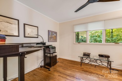 Access this beautifully remodeled Wright-inspired midcentury on Tryon Country Club in North Carolina - for sale on GolfHomes.com, golf home, golf lot