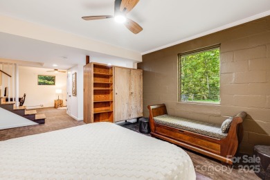 Access this beautifully remodeled Wright-inspired midcentury on Tryon Country Club in North Carolina - for sale on GolfHomes.com, golf home, golf lot