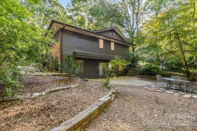 Access this beautifully remodeled Wright-inspired midcentury on Tryon Country Club in North Carolina - for sale on GolfHomes.com, golf home, golf lot