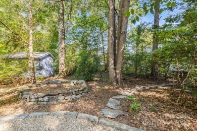 Access this beautifully remodeled Wright-inspired midcentury on Tryon Country Club in North Carolina - for sale on GolfHomes.com, golf home, golf lot